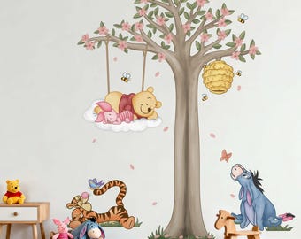 May include: A whimsical wall decal featuring Winnie the Pooh and friends. The design includes a large tree with pink blossoms, a sleeping Pooh and Piglet on a cloud swing, and other characters like Tigger and Eeyore. Bees and butterflies add to the playful scene.