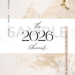 May include: A 2026 planner in a neutral colour scheme, with the text "The 2026 Planner" in elegant script. The design includes the words "Faith, Focus, Flourish" and "Plan with Purpose. Live in Grace."