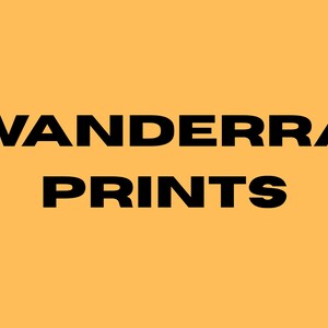 May include: The words "WANDERRA PRINTS" are displayed in bold, black letters against a solid, light orange background. The text is centered, with "WANDERRA" above "PRINTS".