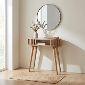 May include: A light brown wooden console table with four tapered legs and a slatted open shelf design. The table features a smooth top surface holding a ceramic vase with dried eucalyptus stems and a small rectangular woven tray.