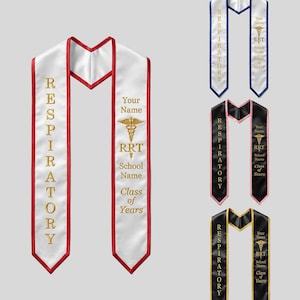 May include: Graduation sash in white with red trim and gold text that reads "RESPIRATORY". The sash also includes text for "Your Name", "RRT", "School Name", and "Class of Years". Additional sashes in blue, black, and pink.