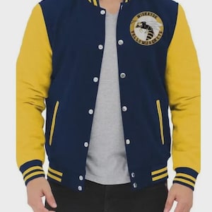 May include: A navy blue and yellow varsity jacket with the text "Wiskayok Yellowjackets" on the chest. The jacket has yellow sleeves, a navy blue body, and white snap closures. The cuffs and collar feature yellow and navy blue stripes.