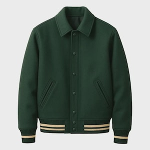 May include: A dark green varsity jacket with a button-up front, two front pockets, and a collar. The cuffs and hem feature cream-colored stripes. The jacket is made of a thick, possibly wool, material.