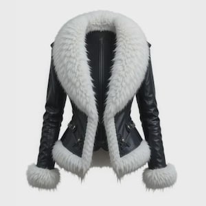 May include: A black leather jacket with a large white fur collar and cuffs. The jacket has a fitted silhouette with decorative buckles and a zipper closure. The fur trim adds a luxurious touch to this outerwear piece.