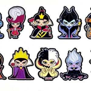 May include: Eleven cartoon character stickers featuring various villains. Each sticker has a black outline and depicts a different character with unique features and colours, such as blue flames, a red heart, and a black top hat.