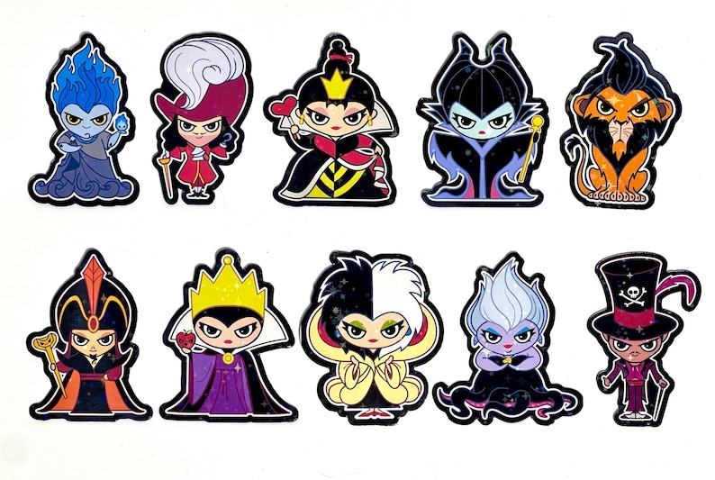 May include: Eleven cartoon character stickers featuring various villains. Each sticker has a black outline and depicts a different character with unique features and colours, such as blue flames, a red heart, and a black top hat.