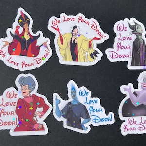 May include: Set of six colorful stickers featuring Disney villains. Each sticker has a different character, including Jafar, Cruella de Vil, and Ursula. The text "We Love Your Door!" is included on each sticker.