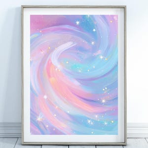 May include: Framed art print with an abstract, swirling design in pastel shades. The artwork displays a mix of pink, blue, and purple tones, with white brushstrokes and sparkling star accents. The print is set within a light grey wooden frame.