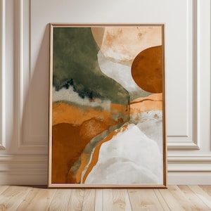 Op de afbeelding: Abstracte kunstprint in een houten lijst. Het kunstwerk toont een mix van aardetinten, waaronder groentinten, oranje en wit. Het ontwerp bevat organische vormen en texturen, wat een moderne en minimalistische esthetiek creëert.