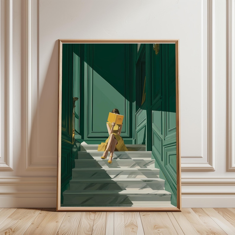 May include: Art print of a person in a yellow dress reading a book on a marble staircase. The background features a green-paneled wall and door, with sunlight casting shadows. The artwork is framed in a wooden frame.