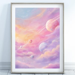 May include: A framed art print featuring a dreamy space scene. Pastel colors of pink, purple, and yellow blend to create a celestial landscape with planets, rings, and clouds. The artwork is set against a light blue sky with sparkling stars.