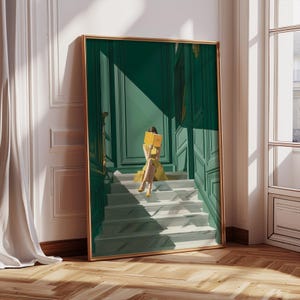 May include: A framed art print depicts a person in a yellow dress reading a book on a staircase. The artwork features a green door and walls, with a gold frame. The stairs are white and gray, and the overall style is elegant.