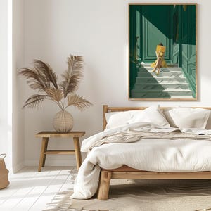 May include: A bedroom scene with a wooden bed, a woven basket, and a decorative vase with dried plants. A framed artwork depicts a person in yellow sitting on green stairs. The room has a neutral color palette.
