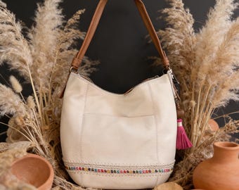 The Sak Beige Leather Hobo Bag with Colorful Detail and Tassel