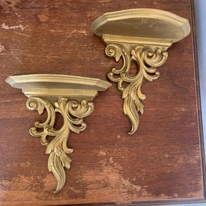Vintage Mid-Century Gold Gilt Syroco Wood Wall Sconce Shelves | Ornate Swirling Acanthus Leaf and Scroll Filigree Details | Set Of 2