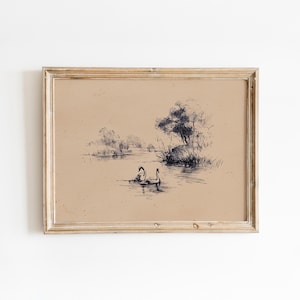 Könnte beinhalten: Gerahmter Vintage-Druck mit einer ruhigen Landschaft mit zwei Schwänen, die in einem See schwimmen. Das Kunstwerk ist eine Schwarz-Weiß-Skizze mit Bäumen und Blättern, vor einem beigen Hintergrund. Der Rahmen ist hellgoldfarben.