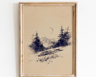 May include: A framed landscape art print featuring a pen and ink drawing of a mountain scene with trees and a crescent moon. The artwork is in shades of blue and black on a tan background, set within a distressed, light-colored wooden frame.