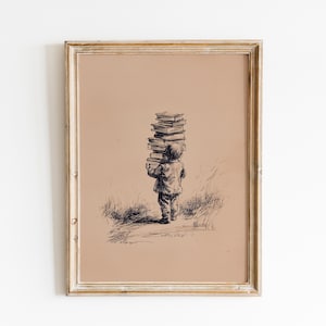May include: A framed sepia-toned print depicts a child carrying a tall stack of books. The artwork is a pen and ink drawing, with the child's figure and the books rendered in black against a tan background. The frame is a light, distressed gold color.