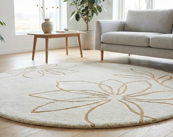 Ivoorkleurig rond wollen vloerkleed met minimale bloemenlijnkunst, handgemaakt modern Scandinavisch vloerkleed