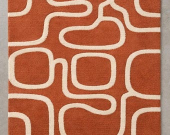 Roest terracotta vloerkleed, geometrisch abstracte lijnen, modern design