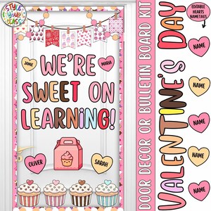 May include: Valentine's Day door decor kit with the text "WE'RE SWEET ON LEARNING!". The kit includes heart-shaped name tags, cupcake illustrations, and a pink gift box. The design features a pink and white color scheme.