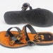 buckled leather slides