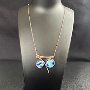 Fused glass abstract swirl pendant necklace in ocean blue tones on rose-tone chain – handmade