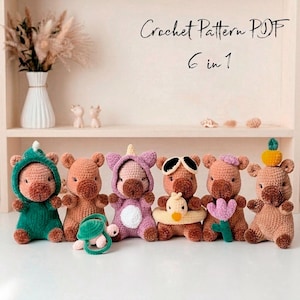 May include: A digital PDF crochet pattern featuring six distinct stuffed animal designs. The image displays six small, crocheted brown creatures with various accessories, including a green hood, a purple hood, sunglasses, a yellow duck, and a flower.