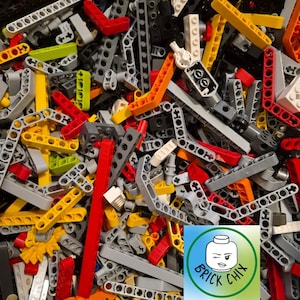 May include: A jumbled assortment of colorful plastic building blocks in various shapes and sizes. The blocks are primarily red, yellow, gray, and orange, with some green and white pieces. The image includes the logo "BRICK CHIX" in a circle.