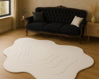 Alfombra abstracta blanca con contornos, hecha a mano: diseño orgánico moderno