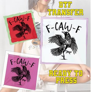 May include: DTF transfer designs featuring a black crow illustration with the text "F-CAW-F" in a bold font. The transfers are ready to press and come in red, pink, and white backgrounds. The words "READY TO PRESS" and "DTF TRANSFER" are also visible.