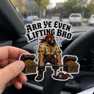 May include: A die-cut sticker featuring a muscular pirate with a red bandana and beard lifting a barbell made of two treasure chests filled with gold coins. The text above the pirate reads, "ARR YE EVEN LIFTING BRO" in bold black letters.
