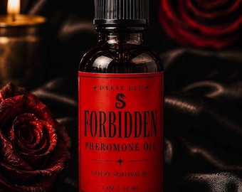 May include: A dark amber glass bottle with a black dropper cap, featuring a red rectangular label with black text that reads DYESE LLC, FORBIDDEN PHEROMONE OIL, LUXURY SPIRITUAL OIL, 1 OZ, and 30 ML, centered with a small serpent symbol.