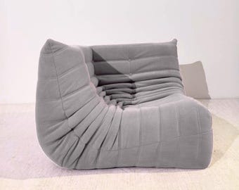 Sofá esquinero gris de pana