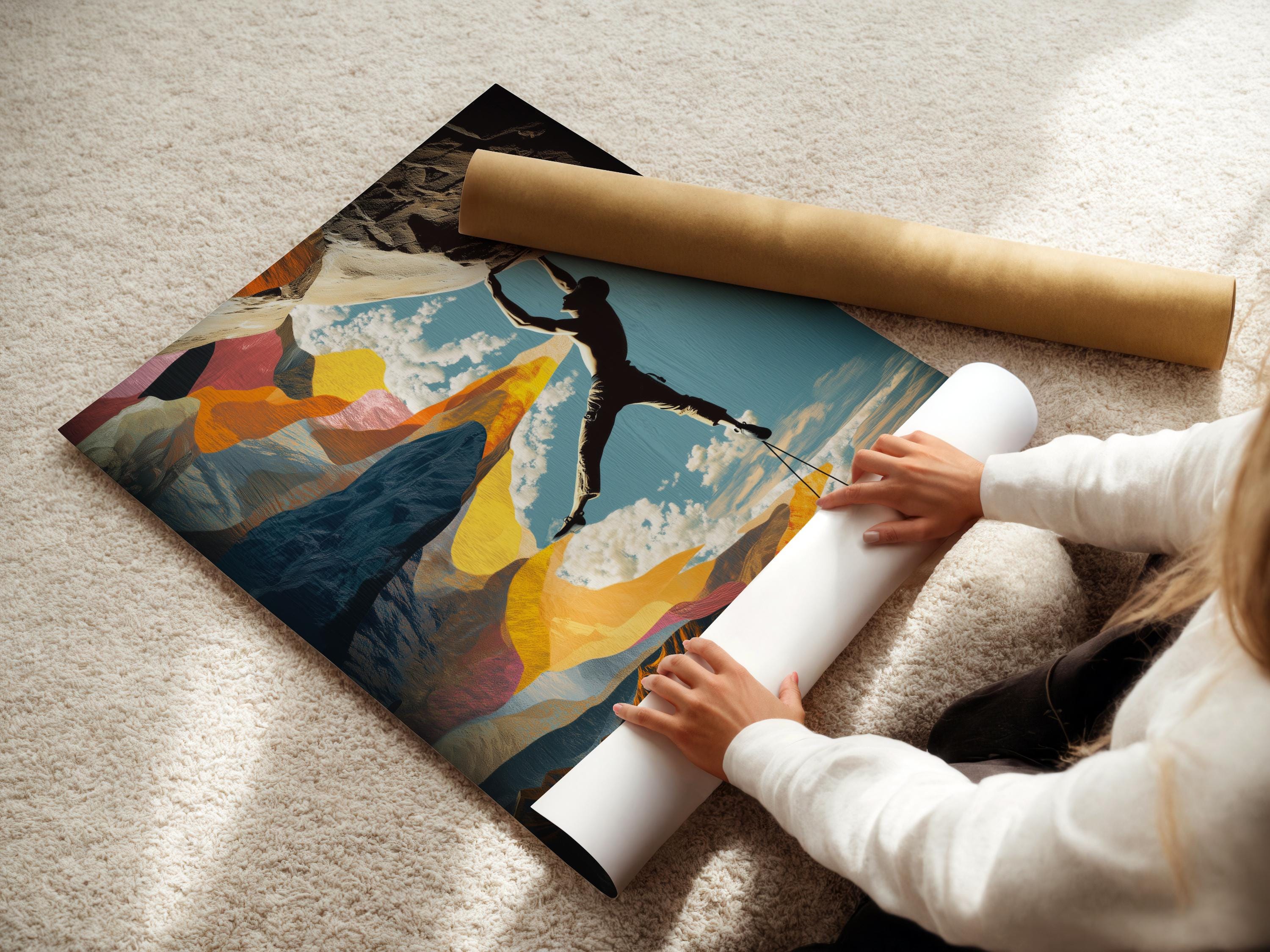 Man sitting near a bench and climbing gear beside a framed climbing artwork on a concrete wall