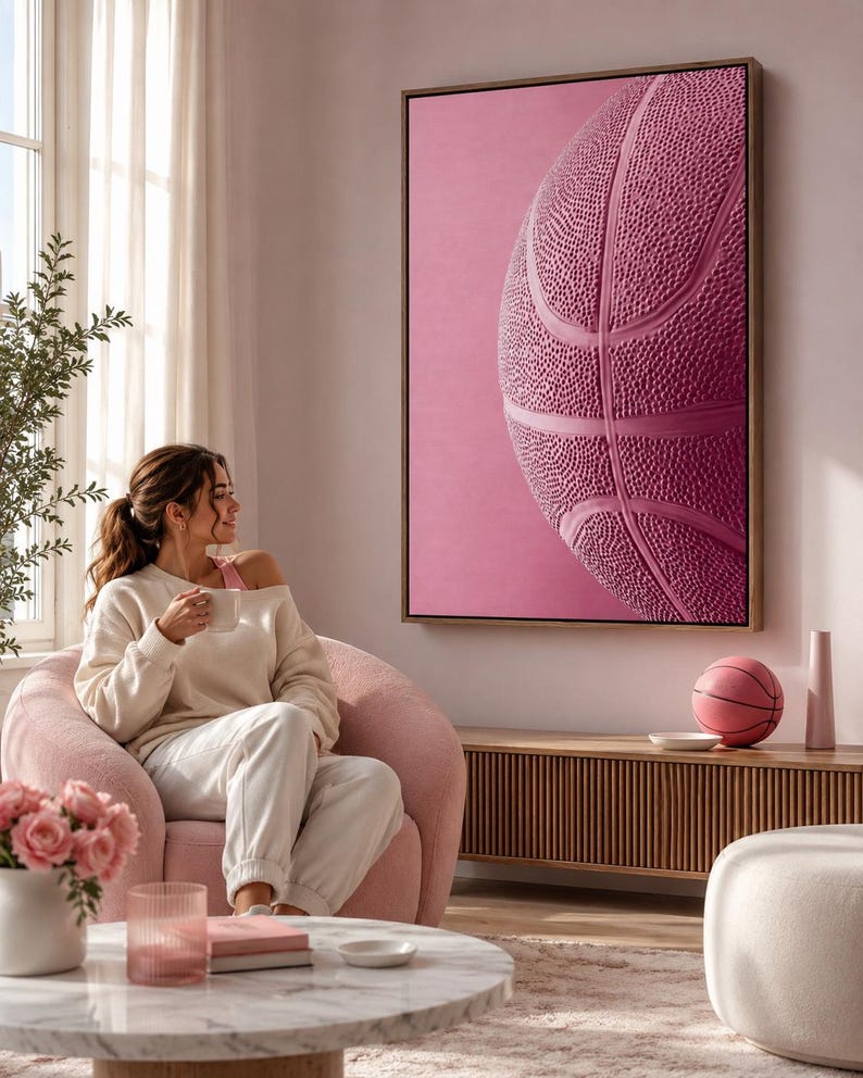 Bubblegum pink basketball artwork with net-like texture and darker pink seam lines