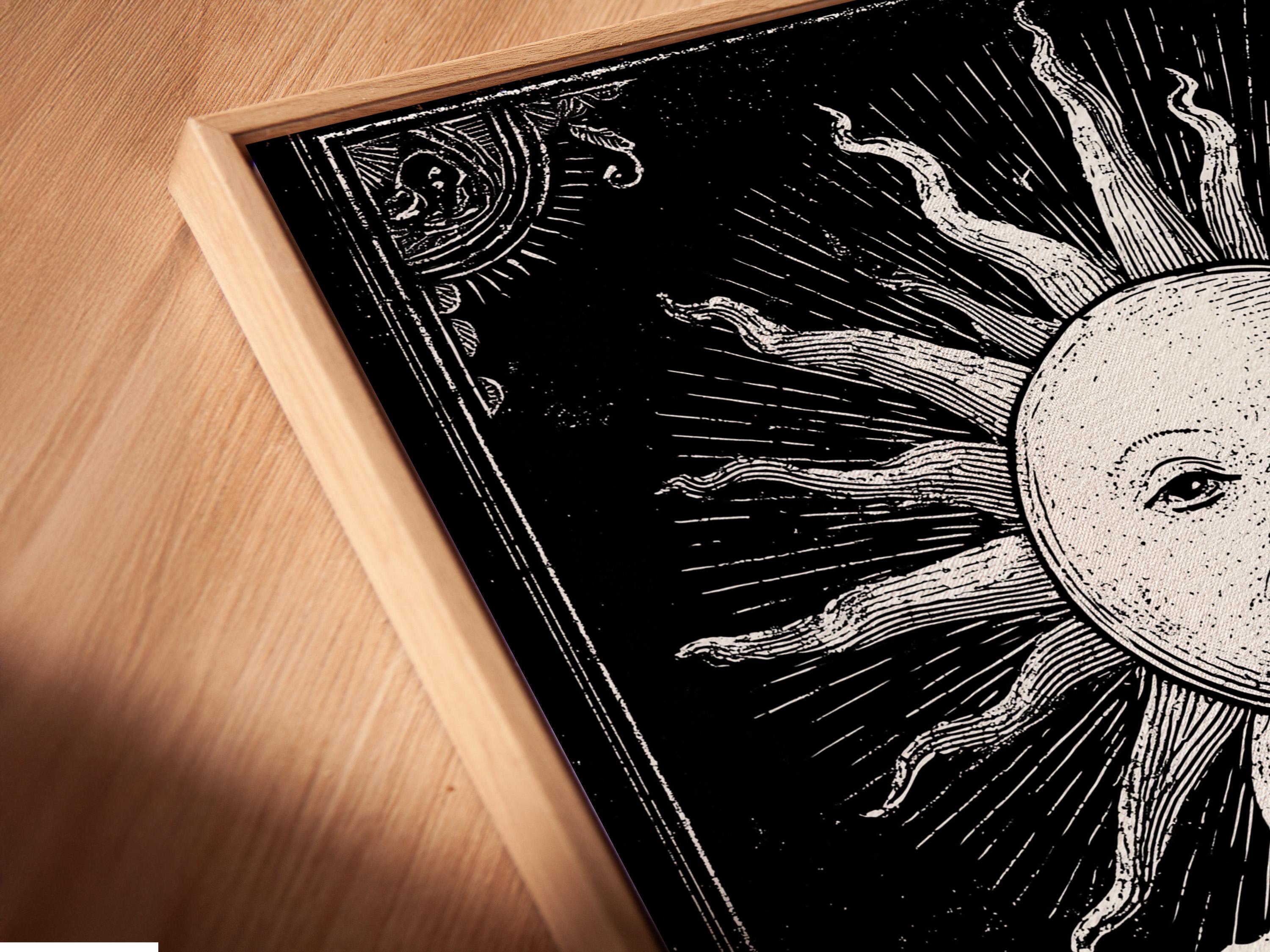 Black and white sun face with radiating rays above two mirrored beer mugs detail view