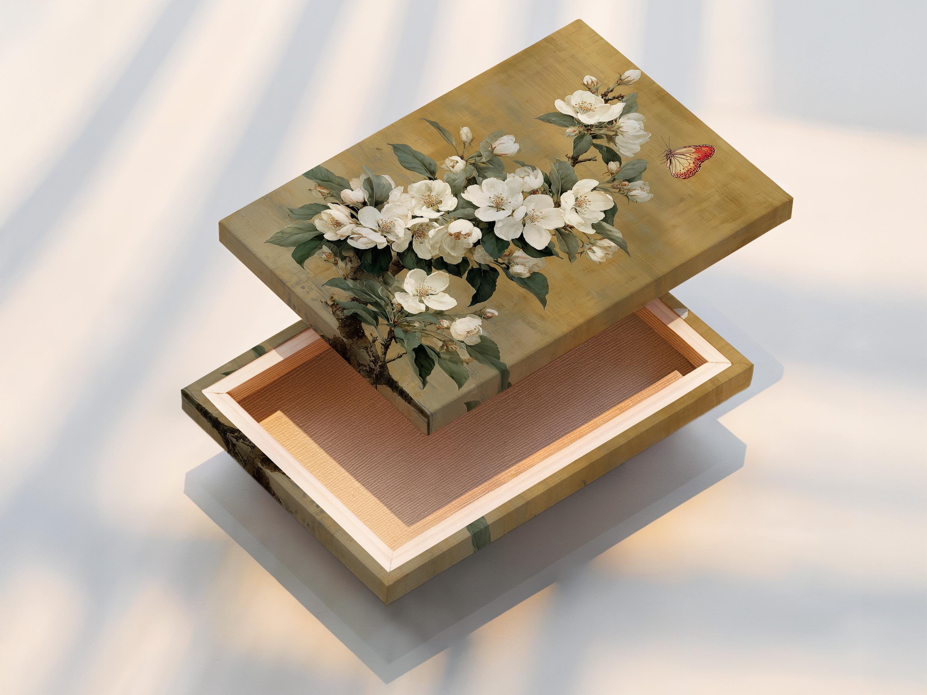 Vertical framed artwork mockup on a light wall with a bouquet of white blossoms and a butterfly
