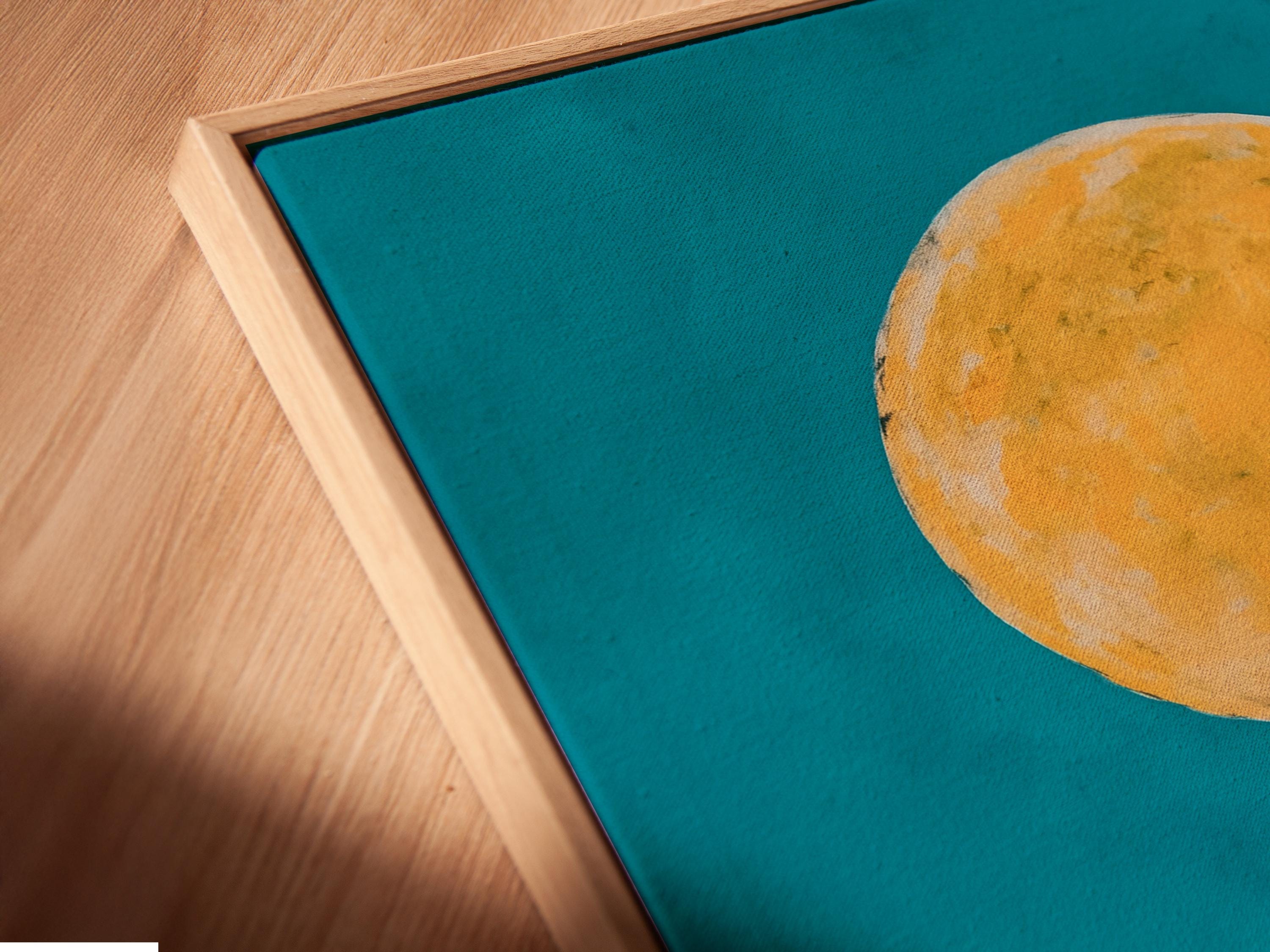 Mockup showing framed wolf moon artwork with a teal background, wolf silhouette and red cliff