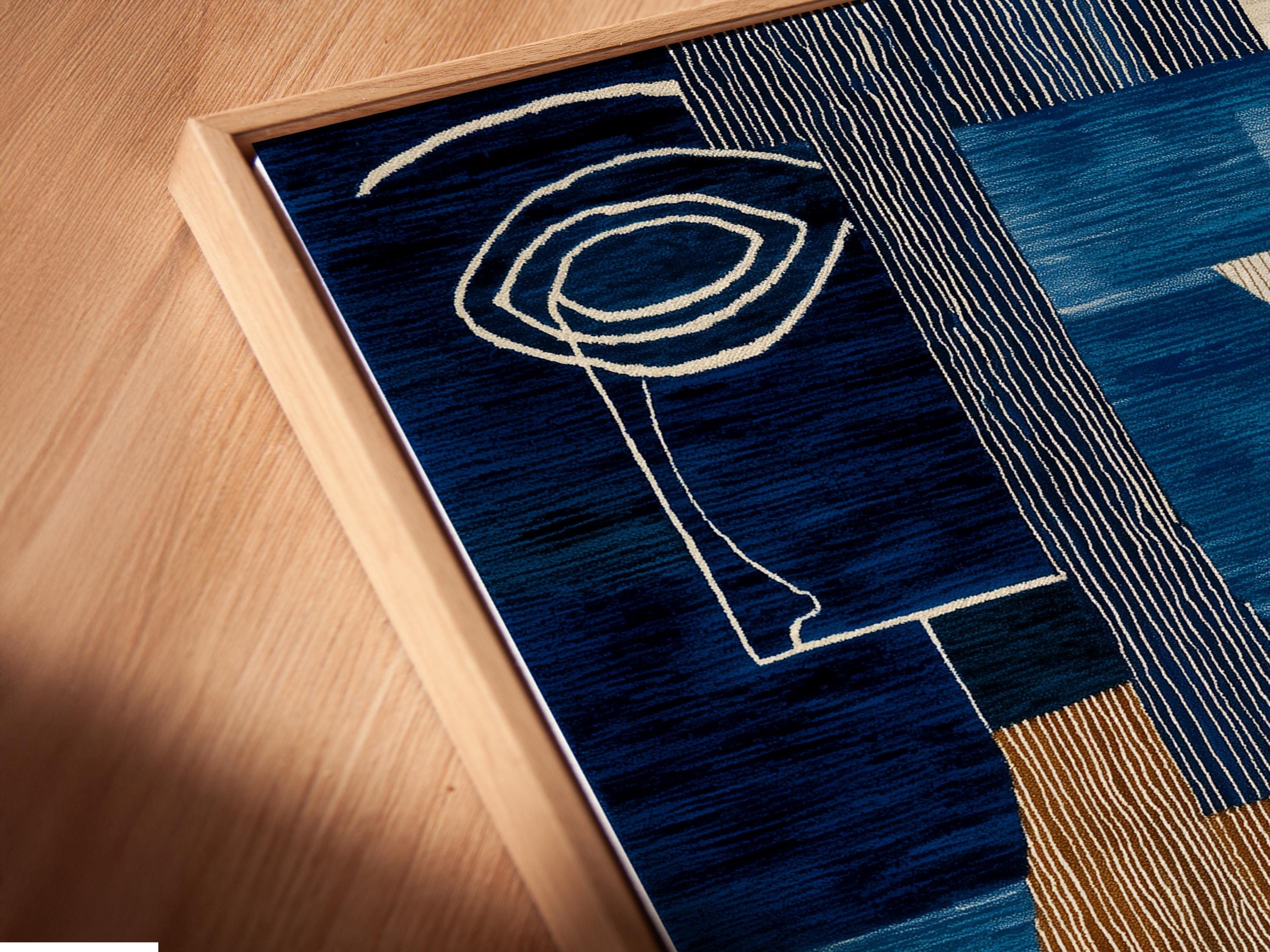 Woman holding a cup in a cafe-like space with a framed blue abstract face artwork on the wall