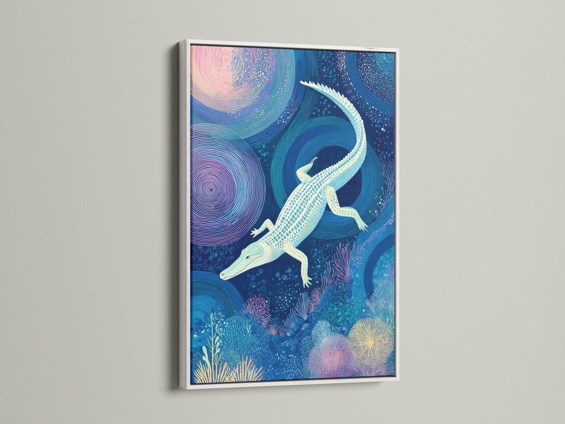 Alligator-themed underwater artwork in a brown frame shown on a wall with small packaging images around it