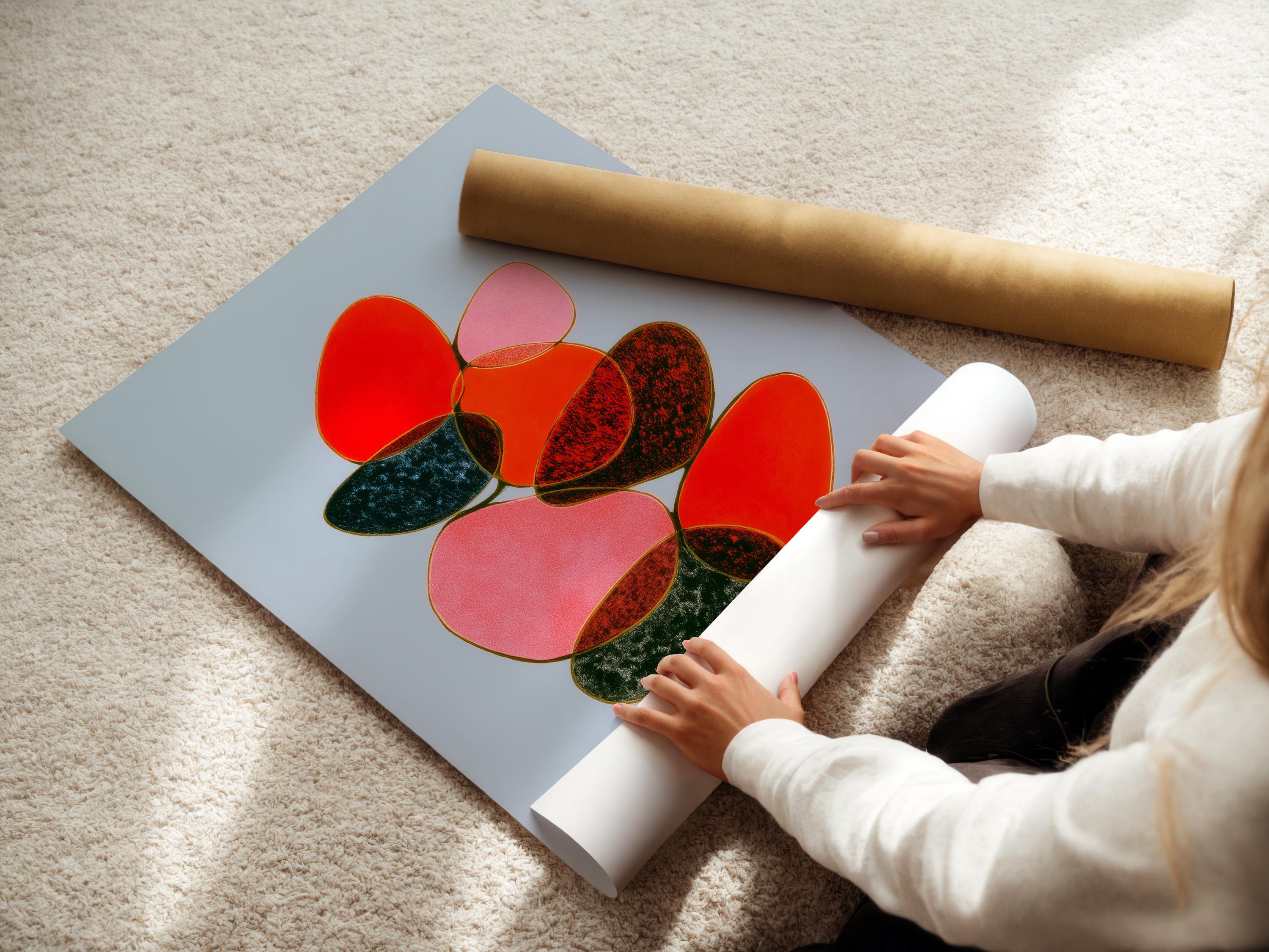 Room mockup showing a framed abstract artwork with overlapping red, pink and green shapes on a light blue background