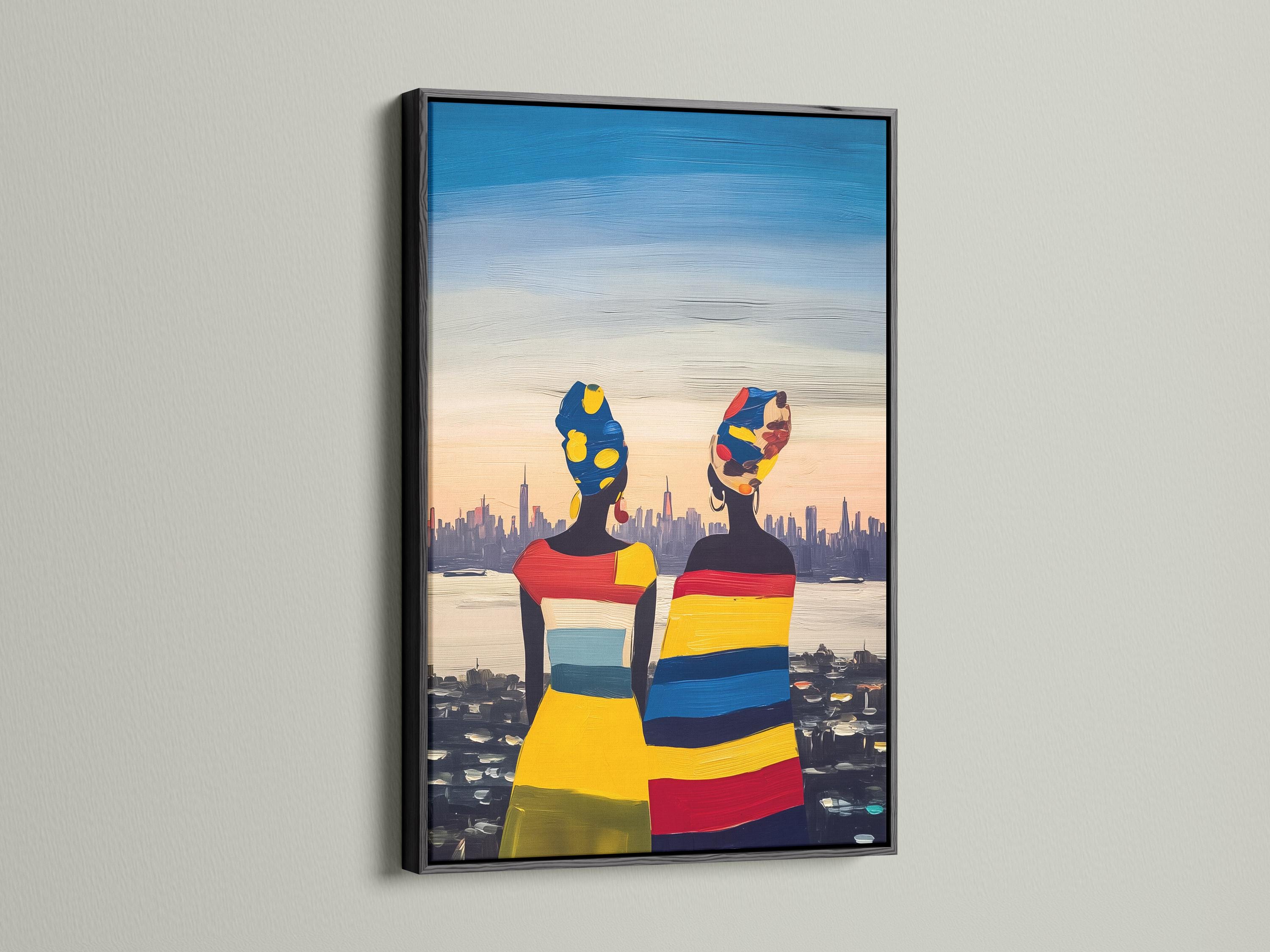Framed artwork mockup showing two stylised women figures in bright colours with a city skyline background
