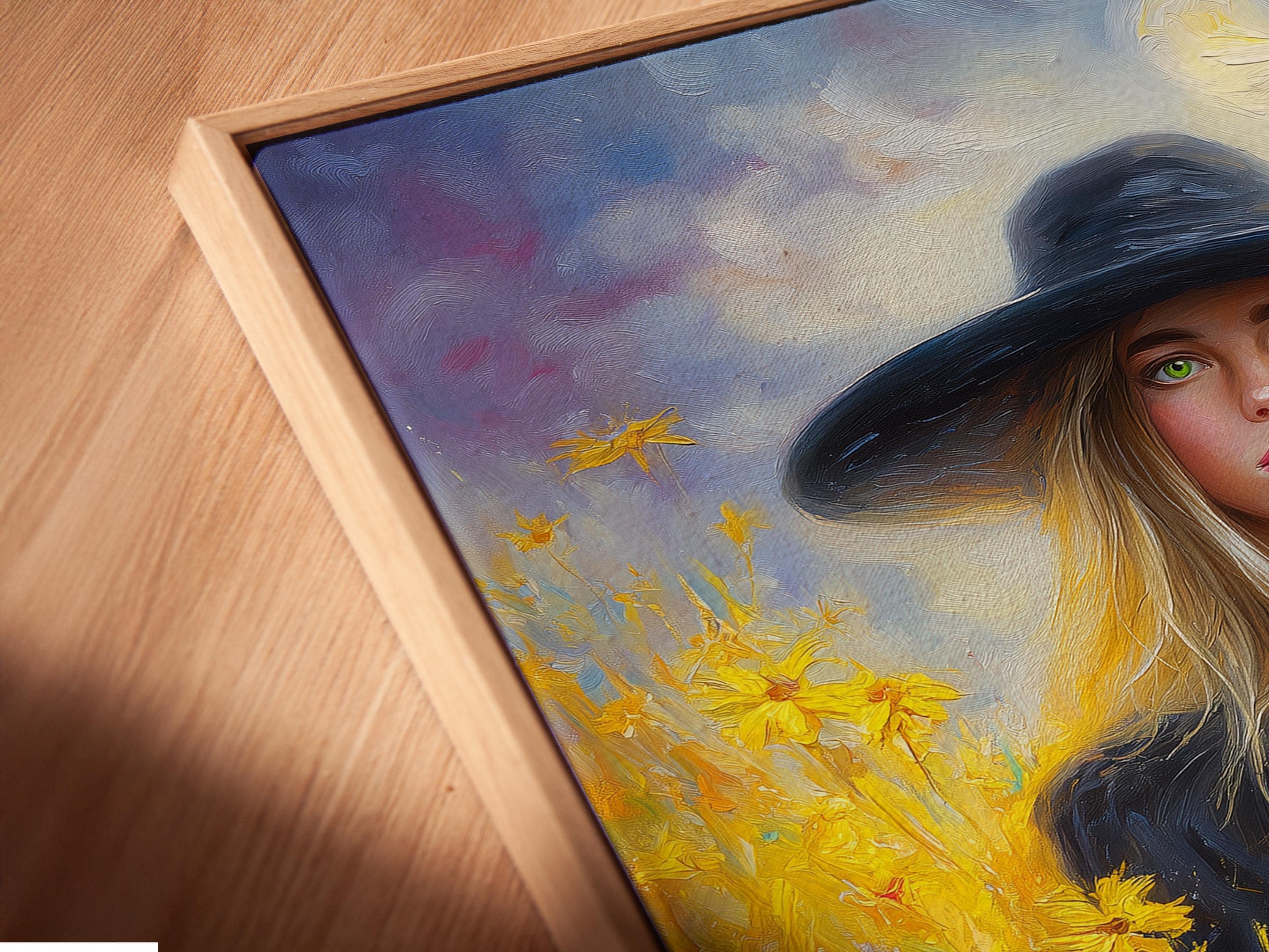 Blonde witch in a wide hat holding a black cat in a field of bright flowers detail view
