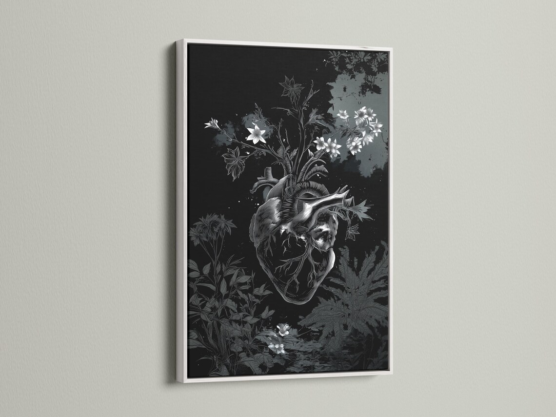 Room mockup showing a framed monochrome botanical heart artwork on a wall