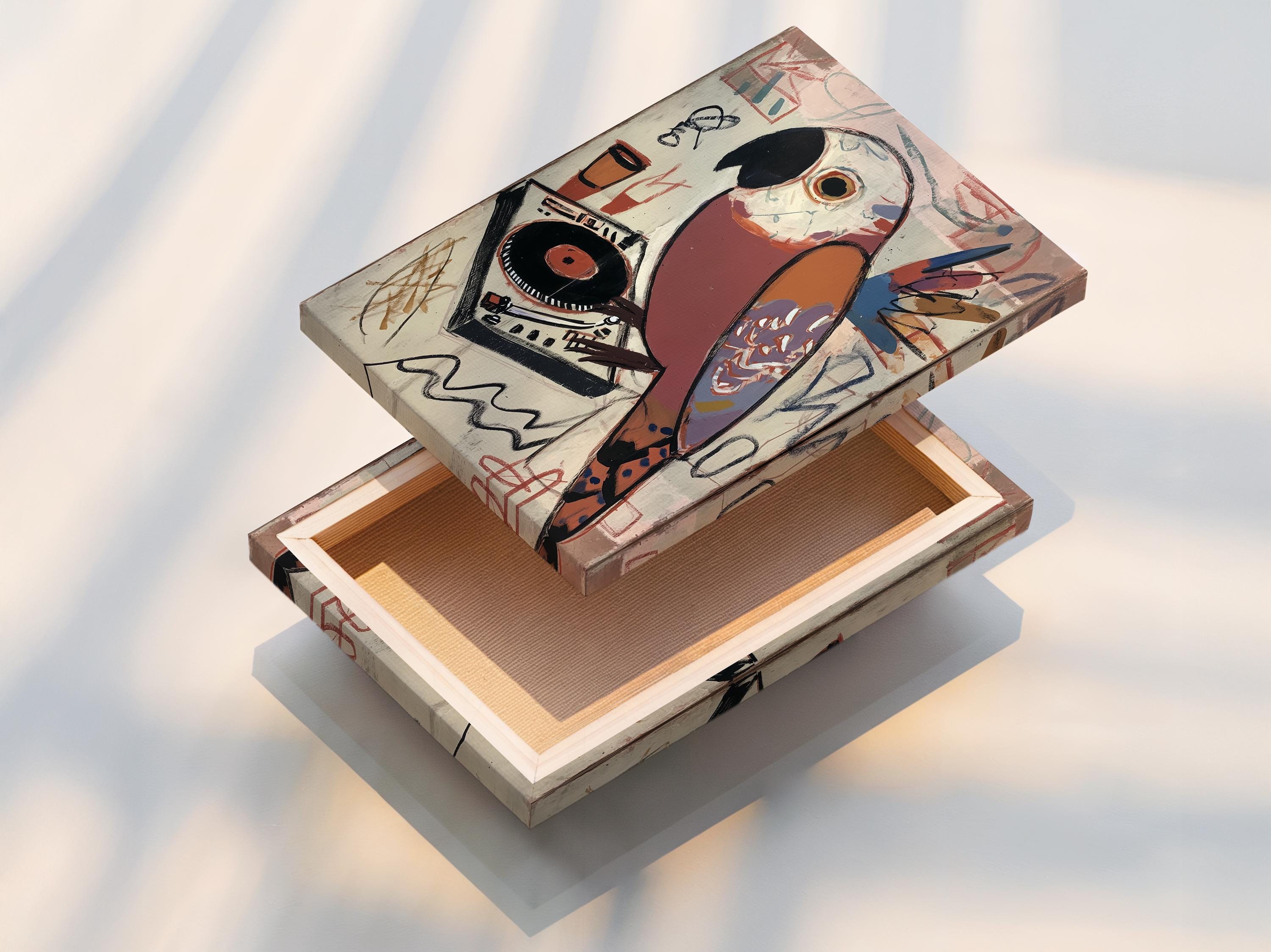 Stylised parrot above a vinyl record and turntable with graffiti-like music doodles detail view