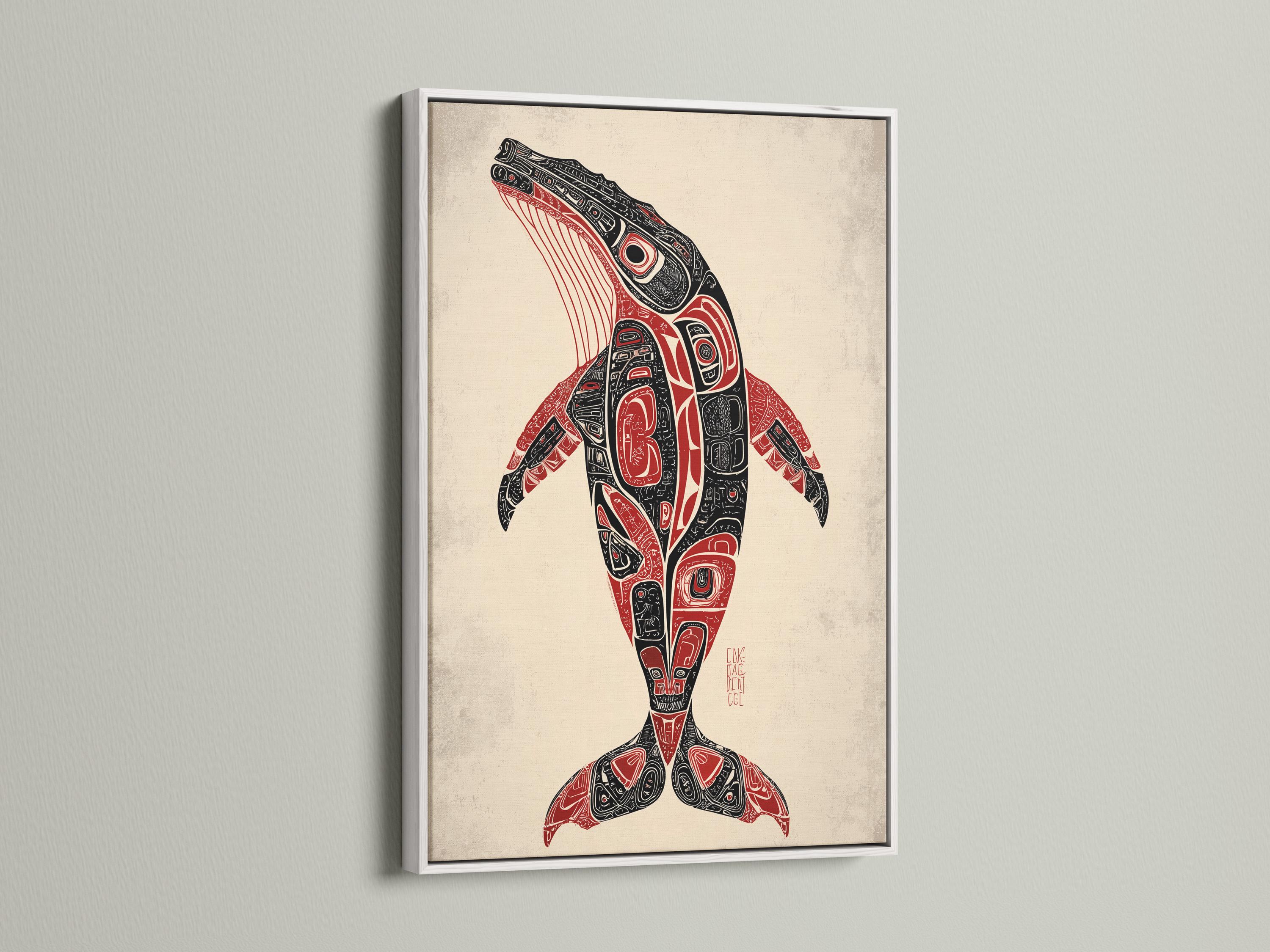 Man holding a mug beside a framed whale artwork in a rustic cabin setting