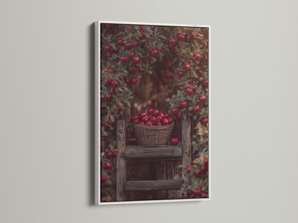 Portrait artwork showing a wicker basket of red apples with leafy branches and a rustic orchard background detail view