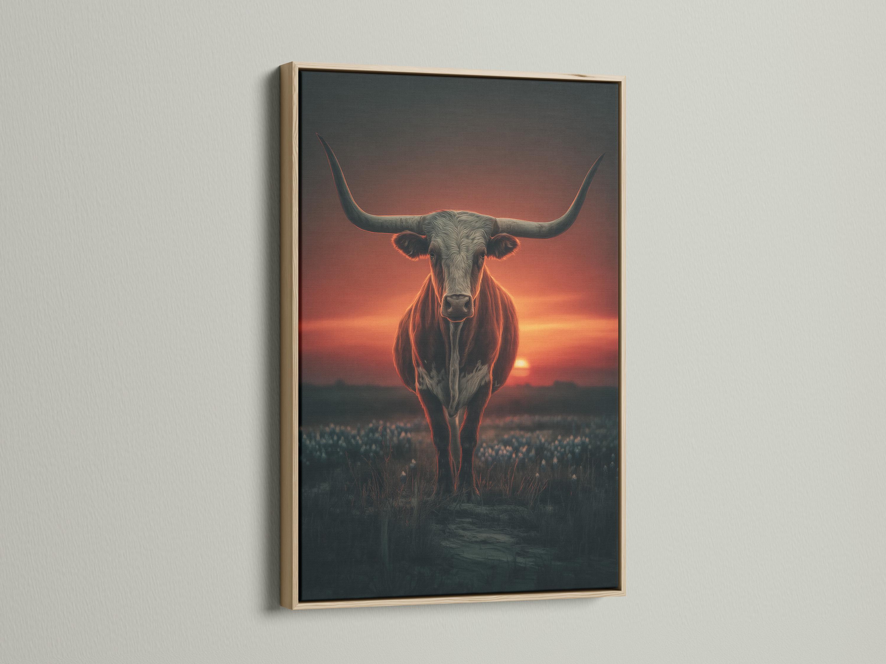 Room mockup showing a framed longhorn bull artwork with a sunset background