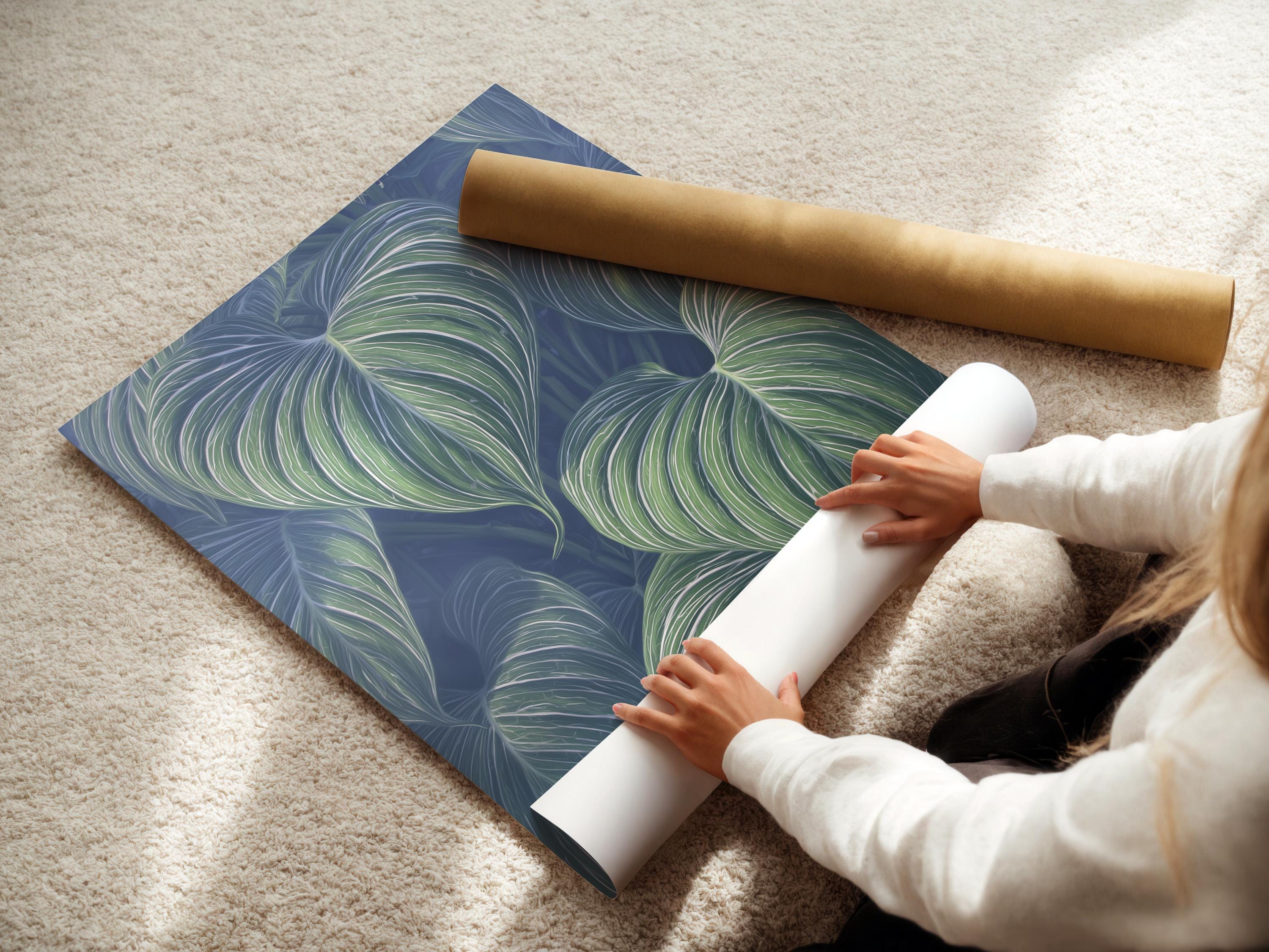 Mockup showing a framed botanical leaf artwork with mint green leaves on a navy-blue background